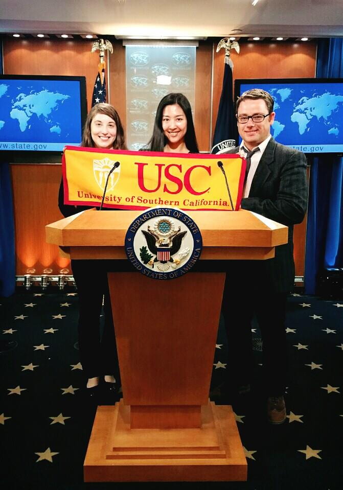 Amanda Lester, Jung-hwa "Judy" Kang, and Justin Chapman in the Press Briefing room at the State Department